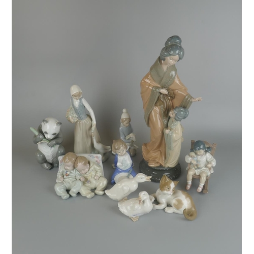 229 - Collection of Lladro and Nao figures