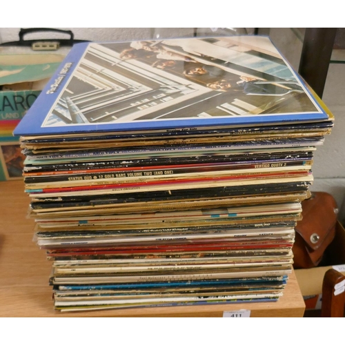 369 - Collection of records to include The Beatles, Status Quo, Bob Dylan, The Style Council etc