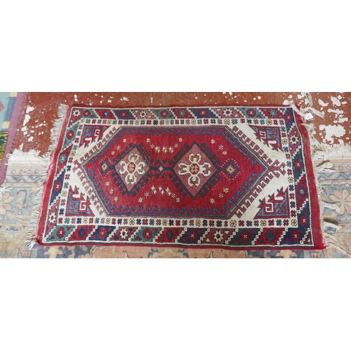 471 - Handwoven Eastern red patterned rug - Approx size: 140cm x 77cm