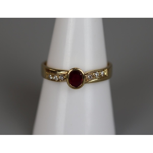 75 - 18ct gold ruby and diamond ring - Size P