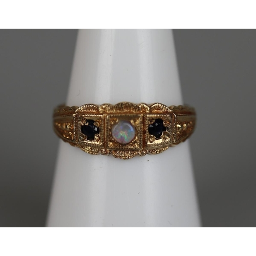 79 - Gold opal and sapphire set ring - Size M