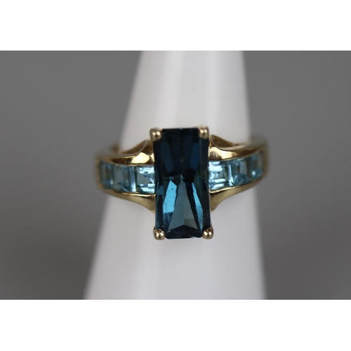 84 - Gold blue topaz set ring - Size L