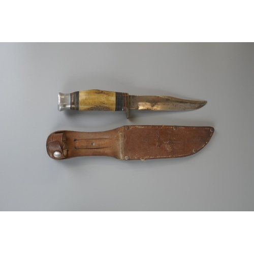 214 - Good collection of knives to include policeman's truncheon