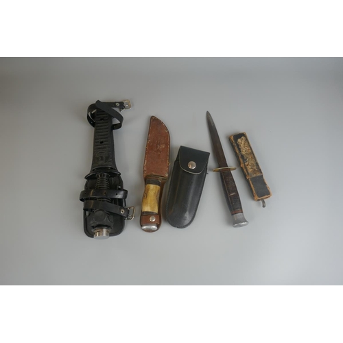 214 - Good collection of knives to include policeman's truncheon