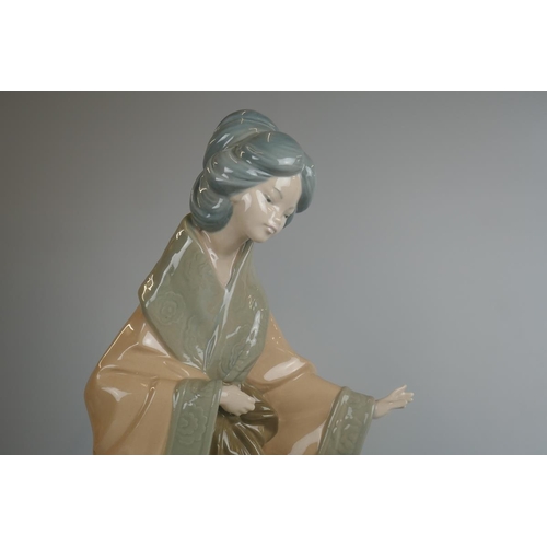 229 - Collection of Lladro and Nao figures