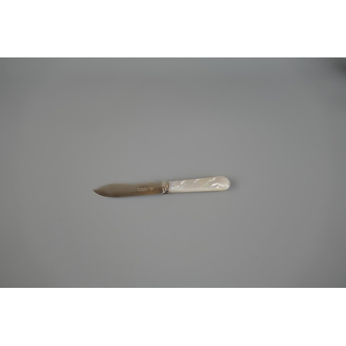 4 - 3 hallmarked silver and mother of pearl fruit knives together with hallmarked silver sugar nips in f... 