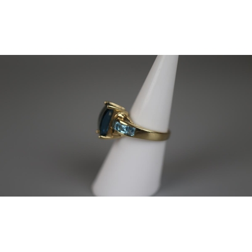 84 - Gold blue topaz set ring - Size L