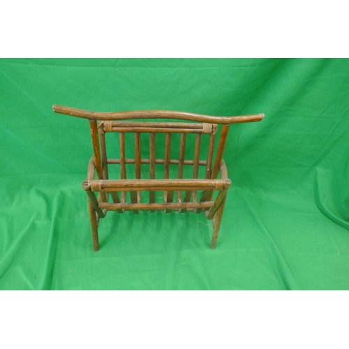 508 - Oak framed leather two seater sofa together with foot stool and bamboo magazine rack