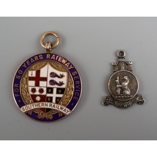 116 - Gold railway medal together with silver Warwick bear pendant