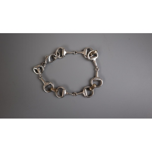 80 - Snaffle horse bit silver and gold metal bracelet