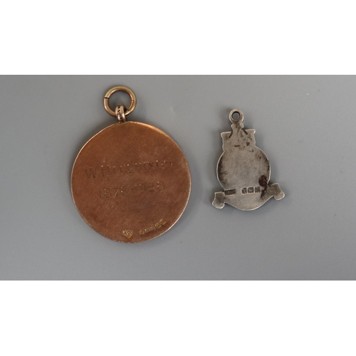 116 - Gold railway medal together with silver Warwick bear pendant