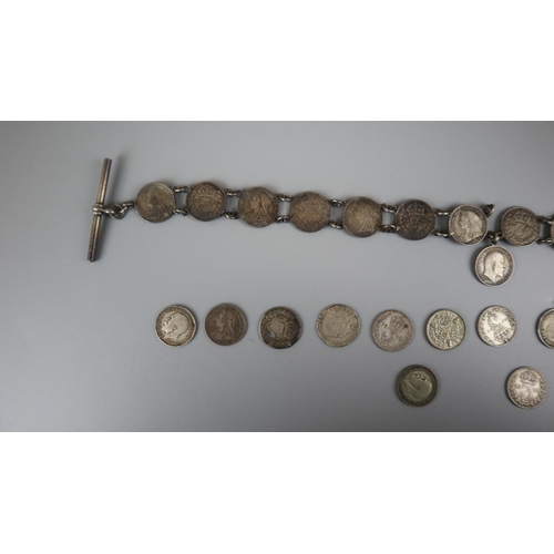 120 - Collection of silver coins together with silver watch chain