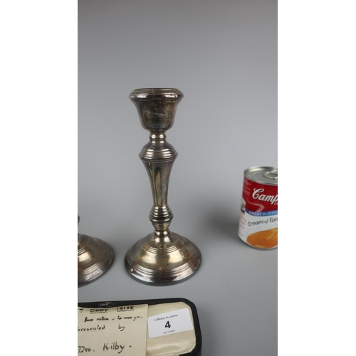 4 - Pair of hallmarked silver candlesticks together with hallmarked silver spoon