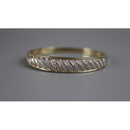 41 - Heavy gold diamond set bangle