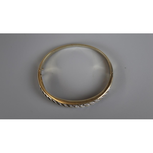 41 - Heavy gold diamond set bangle