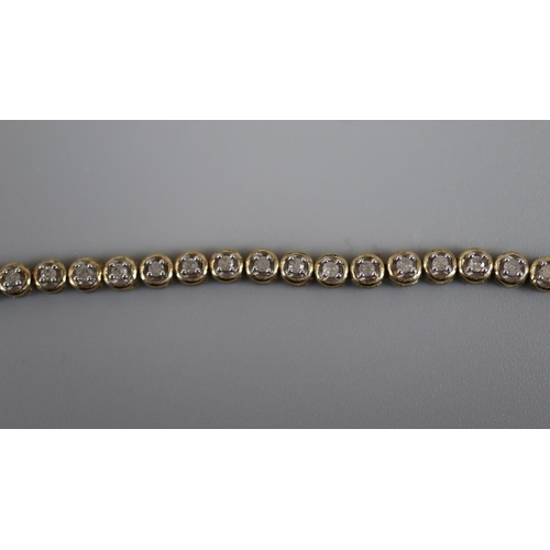 52 - Gold diamond tennis bracelet