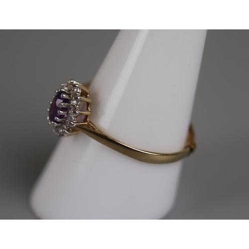 55 - Gold amethyst & diamond set ring - Approx size: S