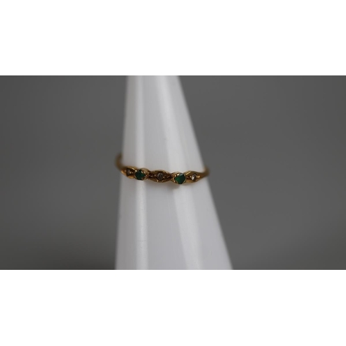 65 - Gold emerald and diamond set ring together with a pair of gold earrings