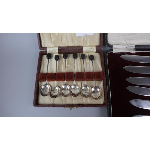 8 - Cased set of 7 hallmarked silver spoons together with a cased set of silver handles knives