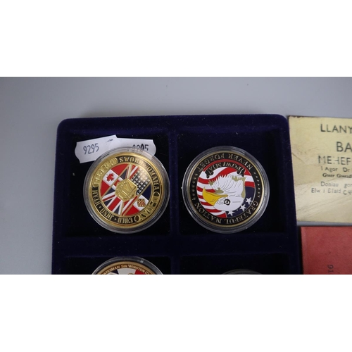 121 - WWII commemorative coins to include Royal Berkshire cap badge