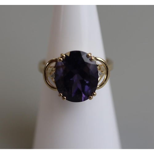 104 - Gold amethyst & diamond set ring - Size K