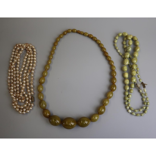 105 - 2 glass necklaces together with a string of cultured pearls