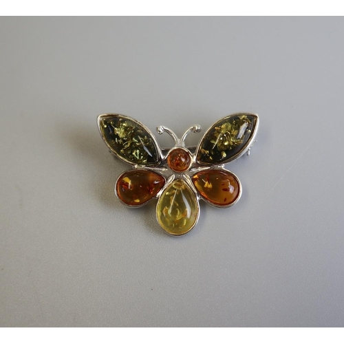 124 - Silver & amber butterfly brooch