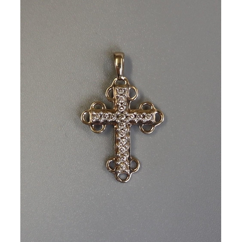 141 - Gold & diamond crucifix