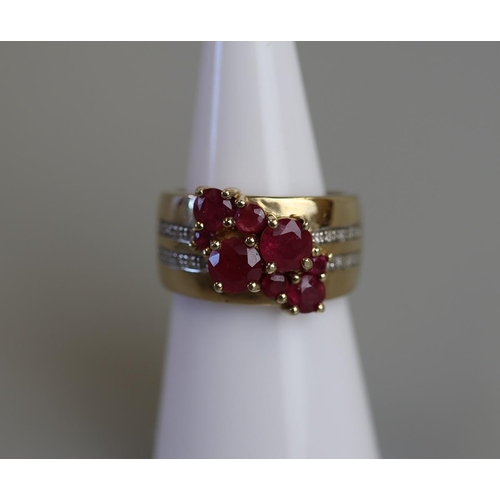 149 - Unusual gold ruby & diamond set ring - Size L