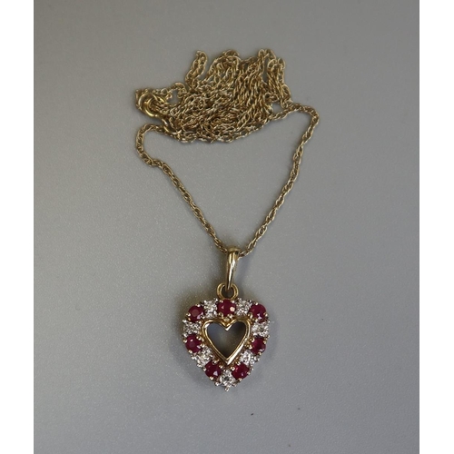 152 - Gold ruby & diamond heart shaped pendant on gold chain