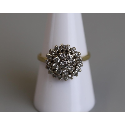 164 - 18ct gold diamond cluster ring - Size Q