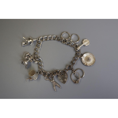 168 - Silver charm bracelet