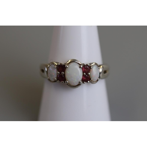 179 - Opal and ruby silver ring