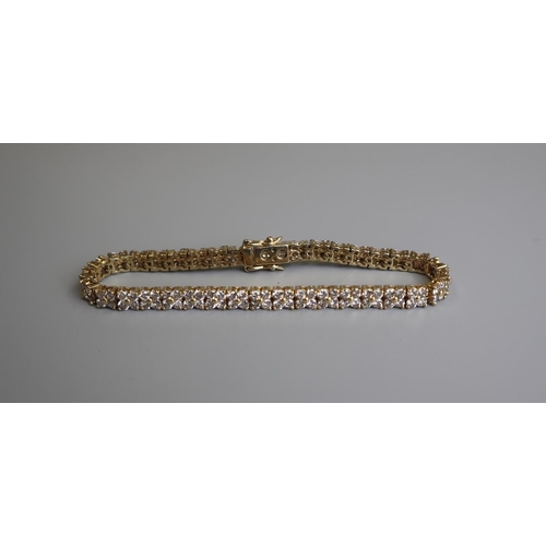 186 - Fine 18ct gold diamond tennis bracelet