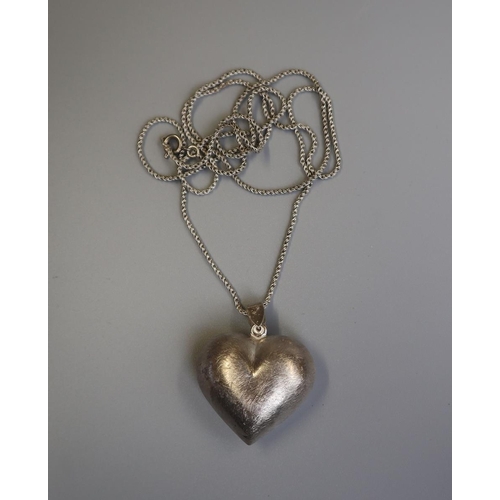 193 - Large silver heart pendant on silver chain