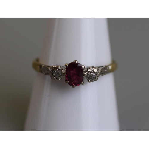 195 - 18ct gold 3 stone ruby & diamond set ring - Size R