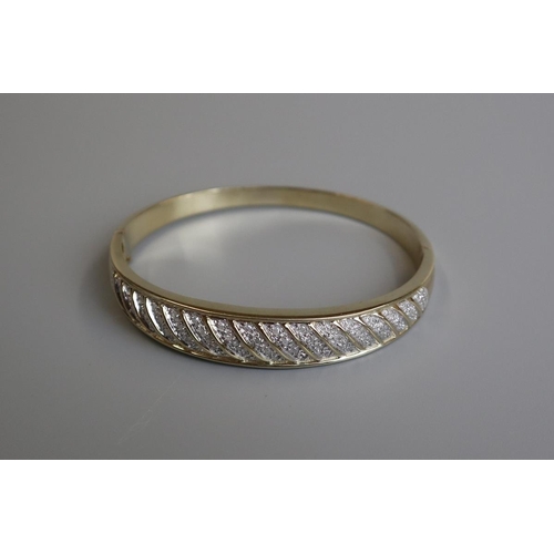 196 - Fine gold & diamond bangle