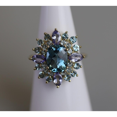 203 - Gold blue topaz set ring - Size K