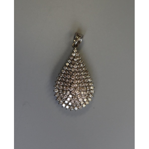 220 - Fine 18ct white gold diamond encrusted pear shaped pendant