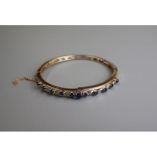 222 - Fine gold sapphire & diamond bangle (total weight approx 15g)