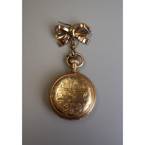 225 - 14ct gold Waltham fob watch (damaged) on gold bow