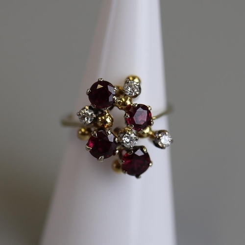 230 - 18ct gold ruby & diamond set ring - Size L