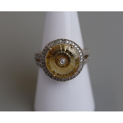 233 - Unusual gold citrine & diamond set ring - Size O