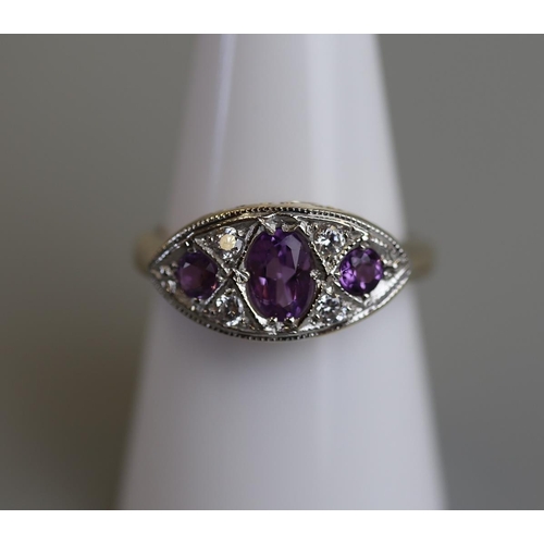 236 - Gold amethyst & diamond set ring - Size O