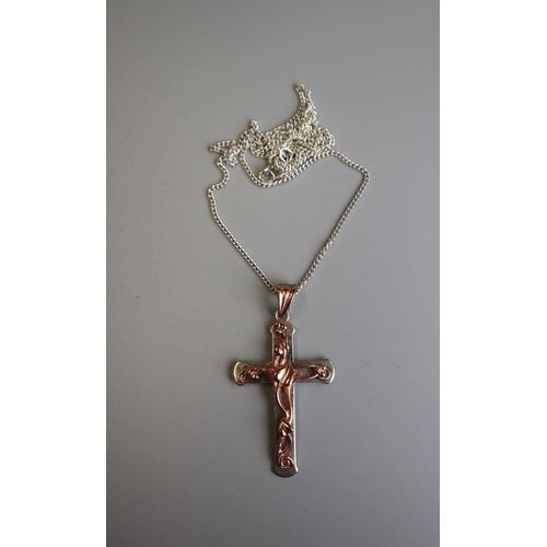 253 - Silver & gold crucifix on silver chain