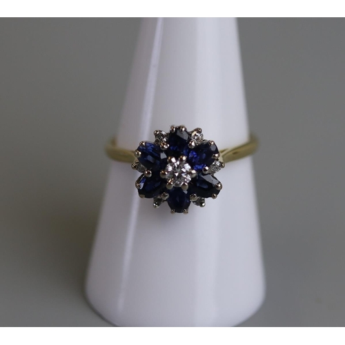 261 - 18ct sapphire & diamond cluster ring - Size P