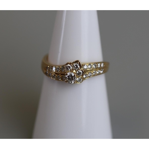 262 - Pretty 18ct diamond set ring - Size L½