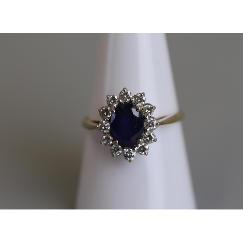 265 - 18ct gold sapphire & diamond cluster ring - Size Q