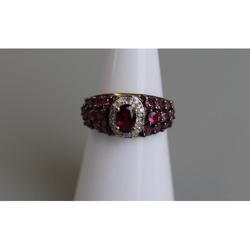 273 - Gold almandine garnet, amethyst & diamond set  ring - Size K½