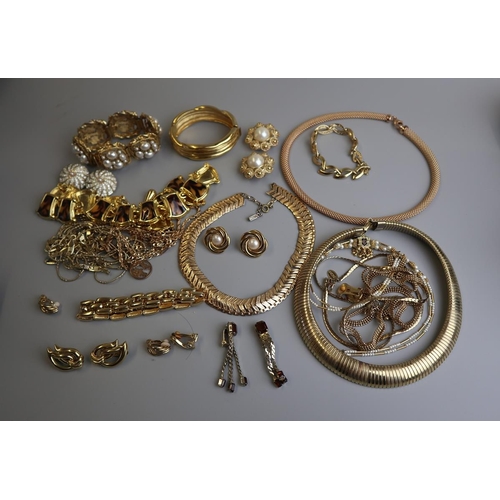 298 - Collection of gold tone & pearl jewellery